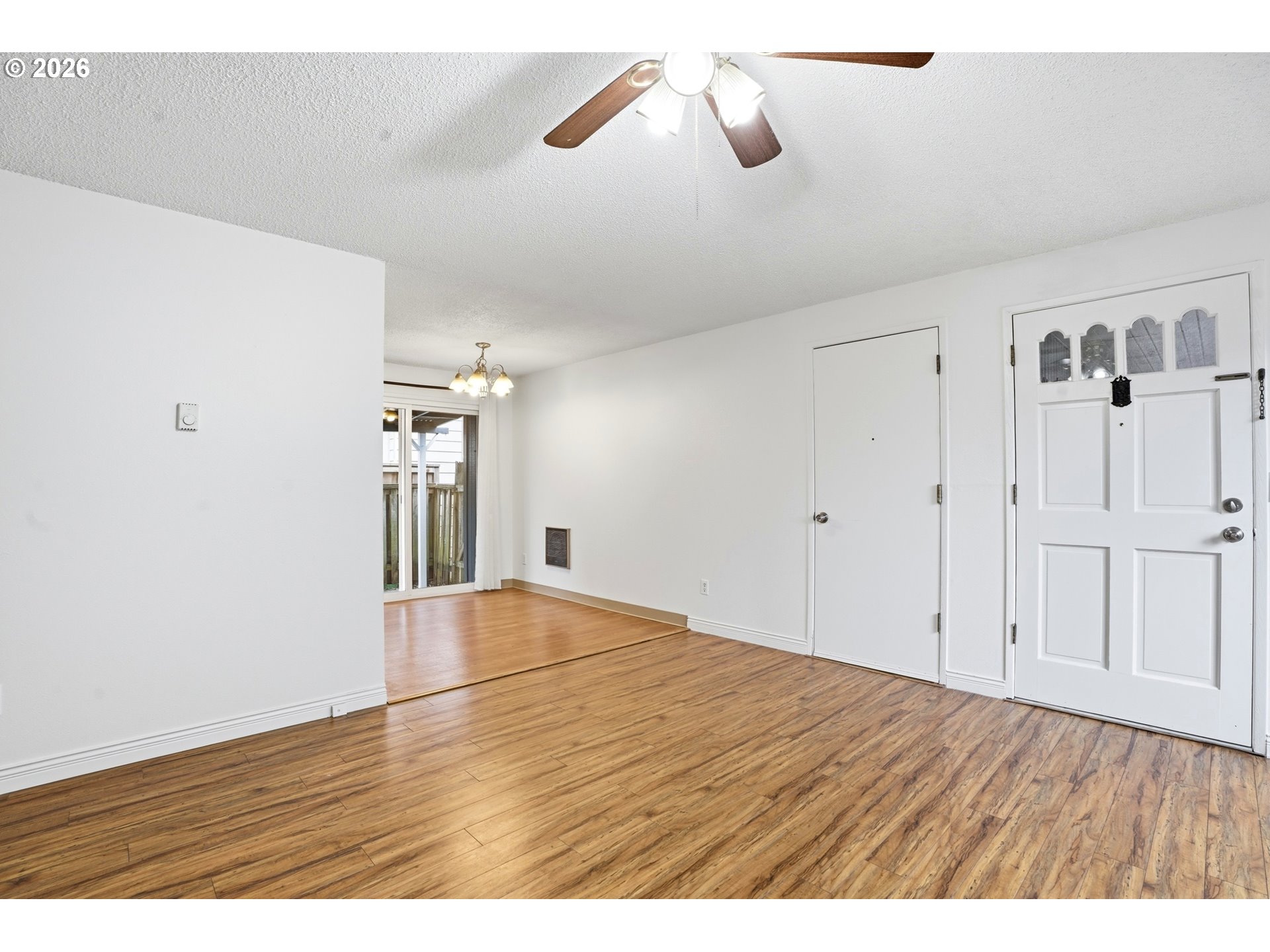 3537 Southeast 64th Avenue Portland, OR 97206 - Photo 7 of 32 a view of empty room with wooden floor