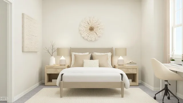 a bedroom with a bed and a table