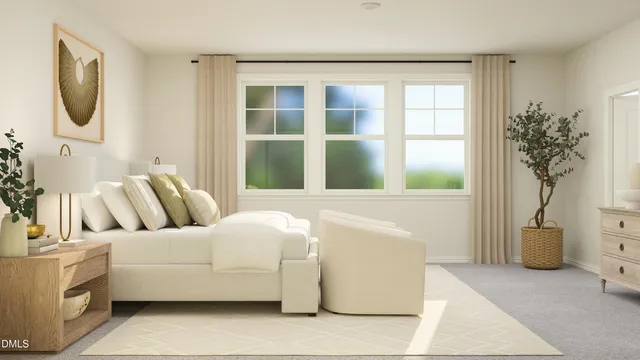 a bedroom with a bed and a chair