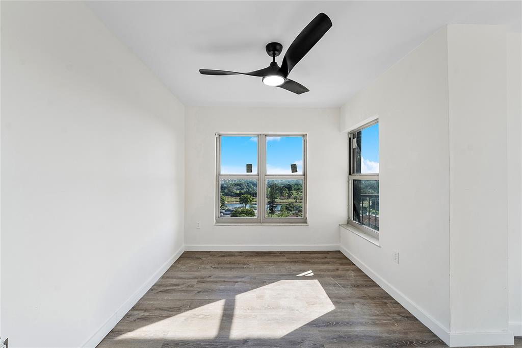 4174 Inverrary Drive, Unit 1002 Lauderhill, FL 33319 - Photo 9 of 28 a view of an empty room and a window