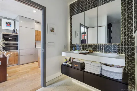a bathroom with a bathtub and a sink