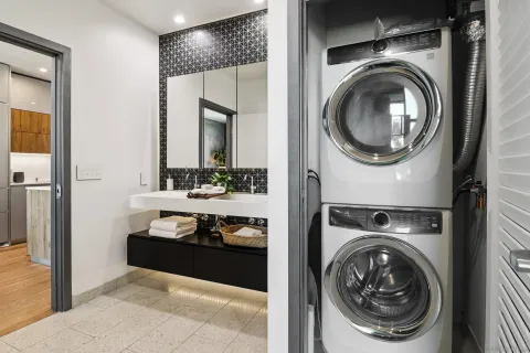 a view of a washer and dryer in a utility room