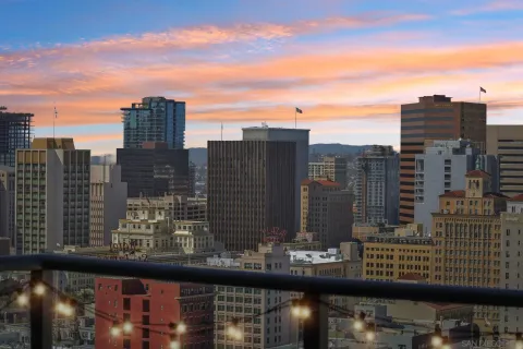 a view of a city with tall buildings