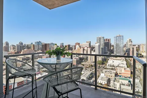 a view of a balcony with city view