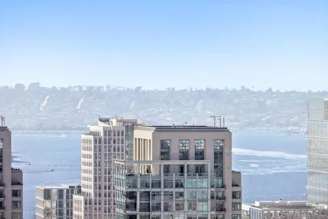 a view of a city with tall buildings