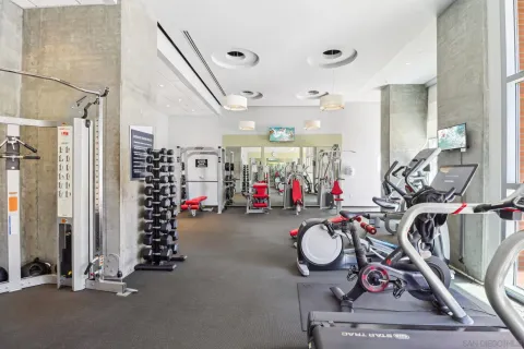 a view of gym equipment and children play room
