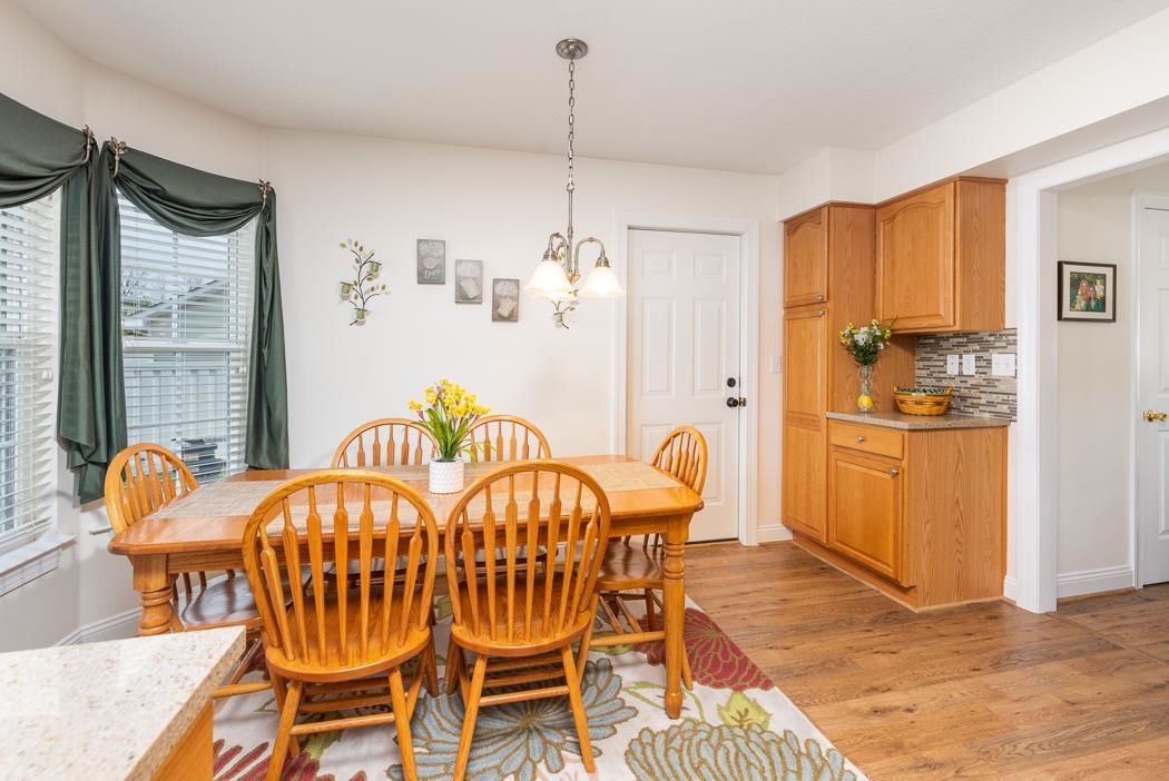 213 Inglecress Road Waynesboro, VA 22980 - Photo 21 of 68 a view of a dining room with furniture window and wooden floor