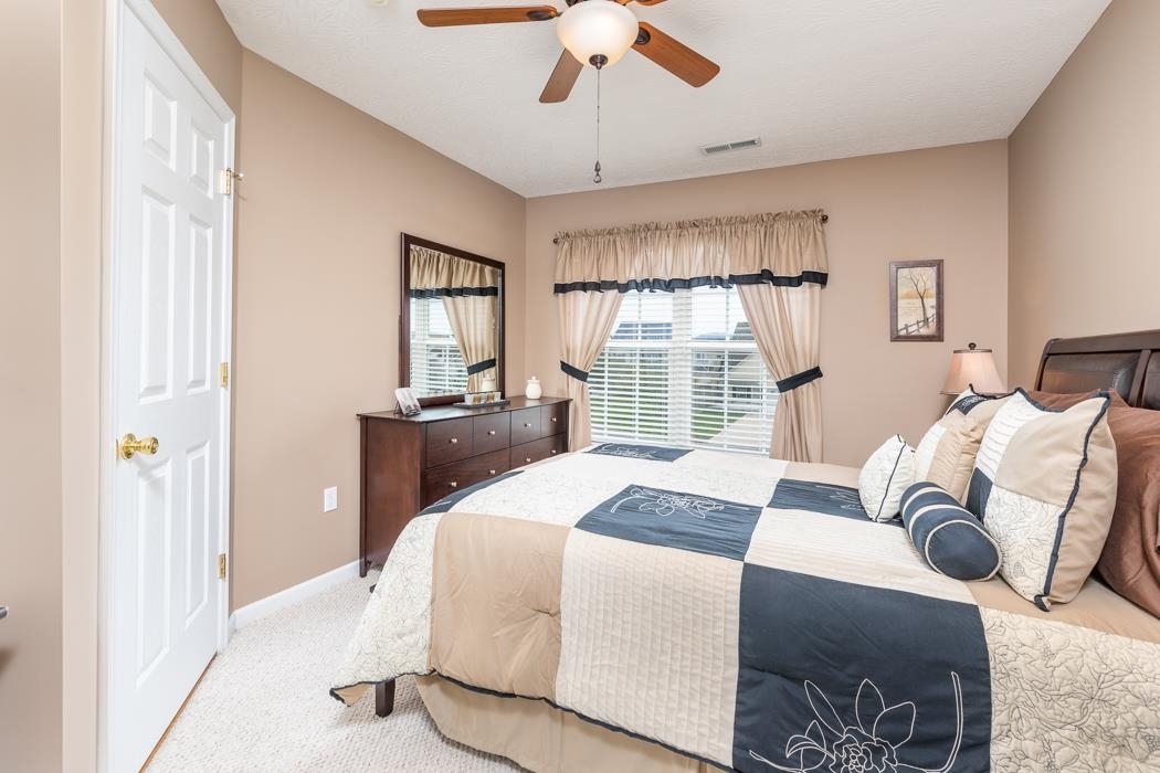 213 Inglecress Road Waynesboro, VA 22980 - Photo 39 of 68 a bedroom with a bed and wooden floor