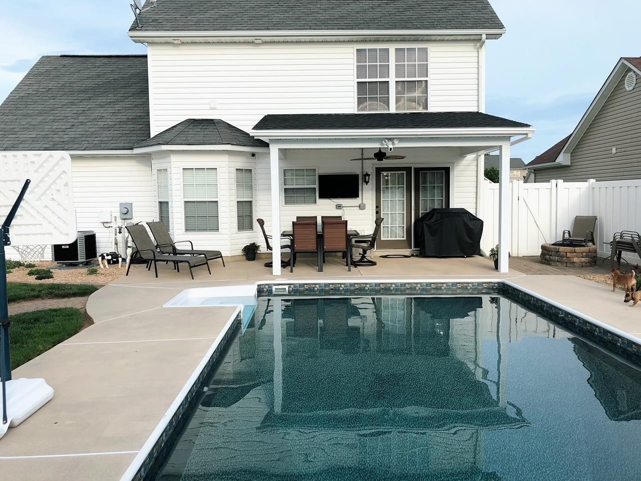 213 Inglecress Road Waynesboro, VA 22980 - Photo 59 of 68 a view of a patio with couches chairs and kitchen view