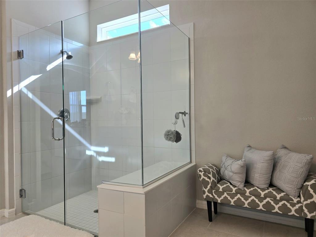 1973 Spring Shower Circle Kissimmee, FL 34744 - Photo 23 of 43 a bathroom with a tub and shower