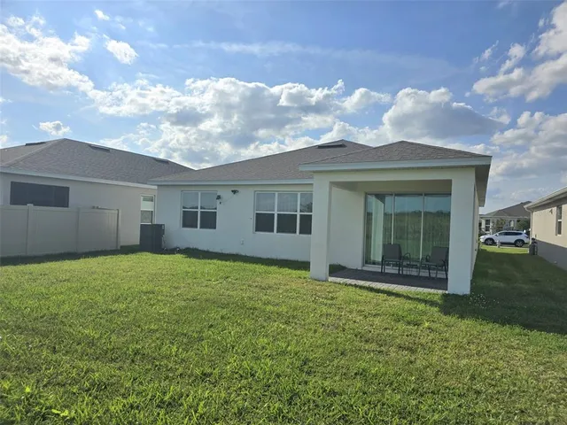 a view of a yard in front of a house