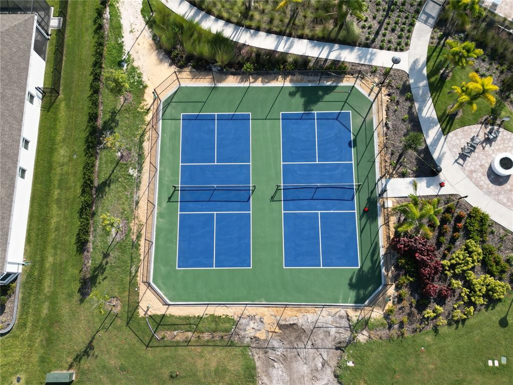 1973 Spring Shower Circle Kissimmee, FL 34744 - Photo 43 of 43 a view of a house with a tree and plants