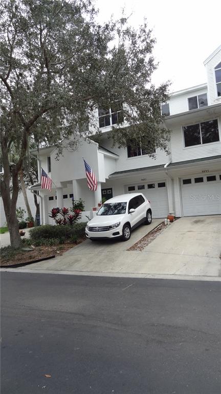 9897 Indian Key Trail Seminole, FL 33776 - Photo 1 of 1 a car parked on the side of the road
