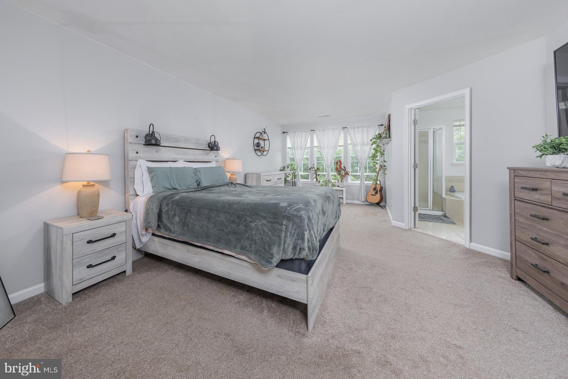 372 Concetta Drive Mount Royal, NJ 08061 - Photo 13 of 25 a bedroom with a bed and a dresser