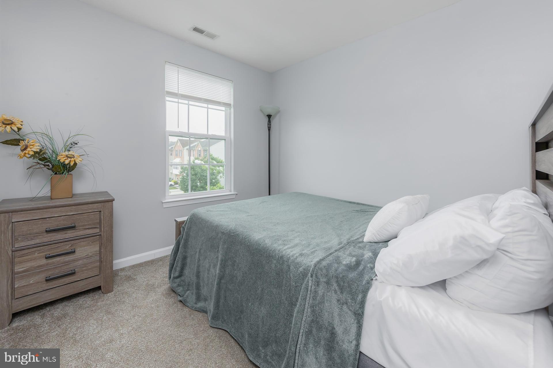 372 Concetta Drive Mount Royal, NJ 08061 - Photo 15 of 25 a bedroom with a bed and a window