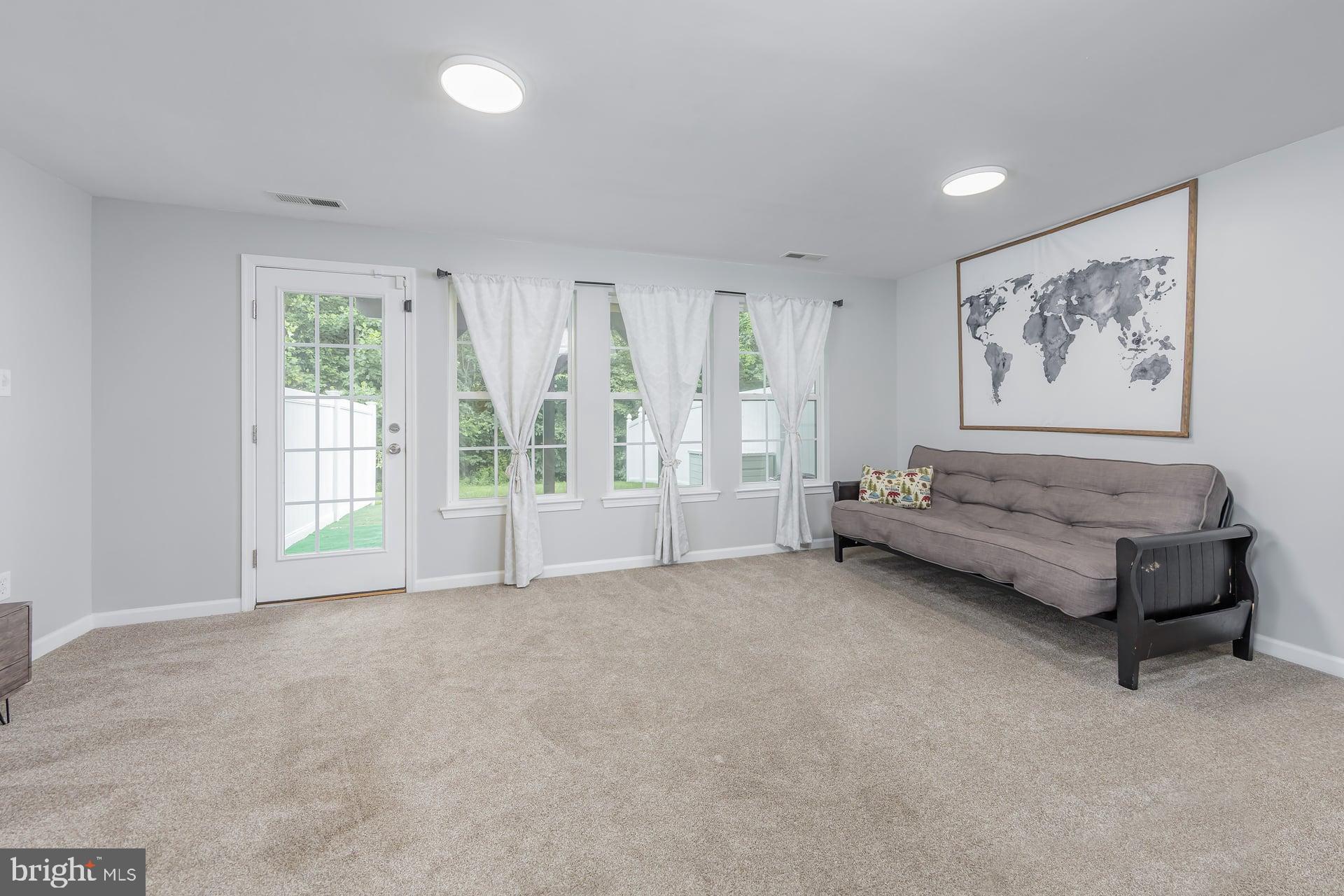 372 Concetta Drive Mount Royal, NJ 08061 - Photo 19 of 25 a spacious bedroom with a bed and a large window