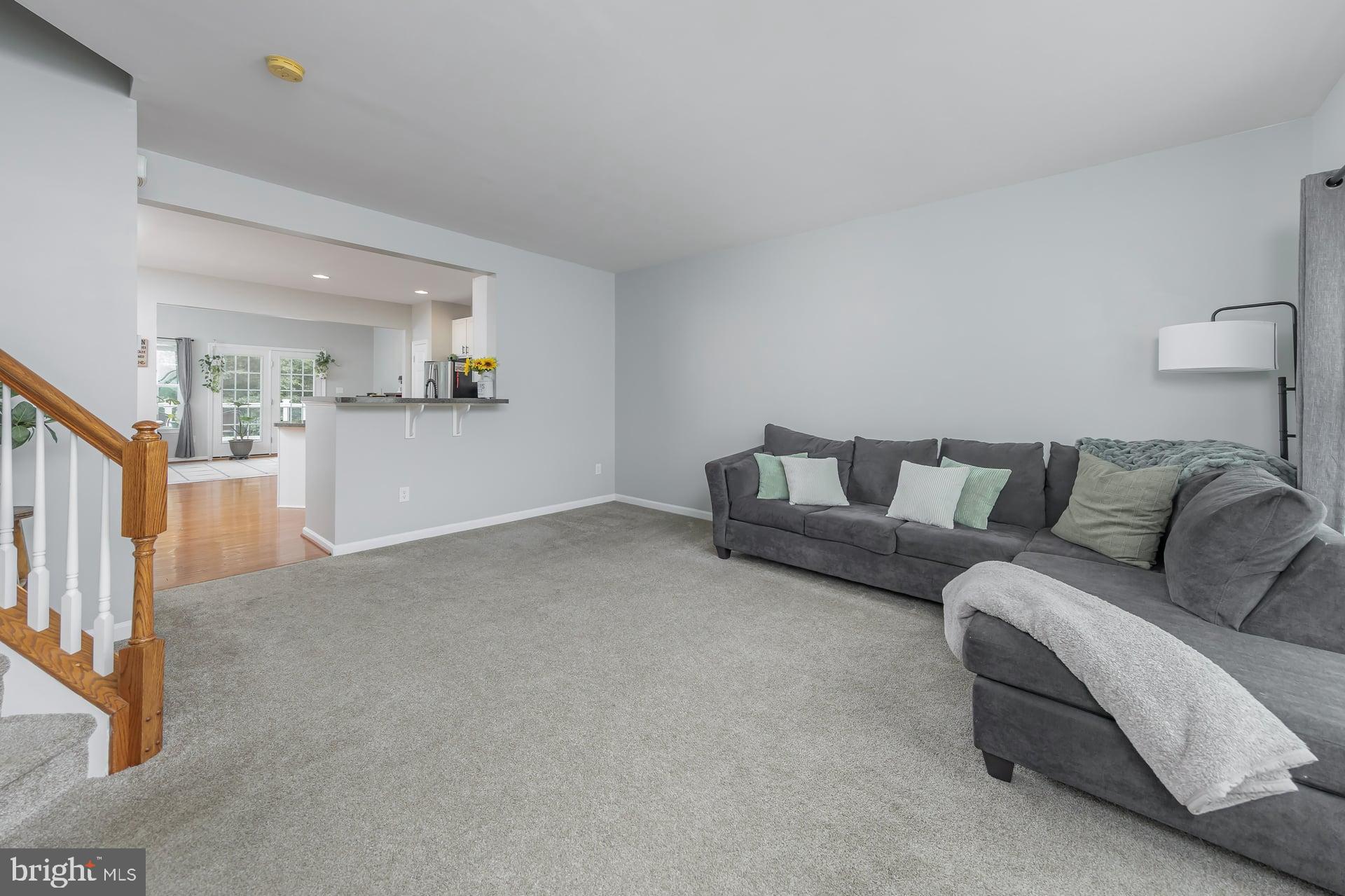 372 Concetta Drive Mount Royal, NJ 08061 - Photo 4 of 25 a living room with furniture and a couch