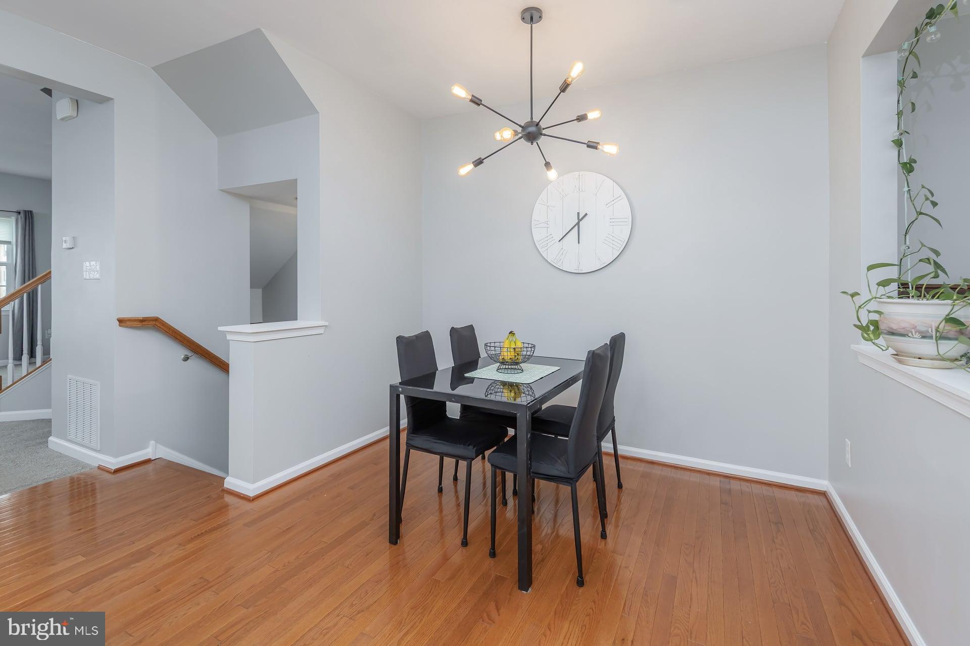 372 Concetta Drive Mount Royal, NJ 08061 - Photo 9 of 25 a view of a dining room with furniture and wooden floor