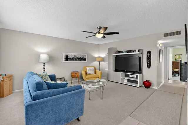 a bedroom with a bed and a table