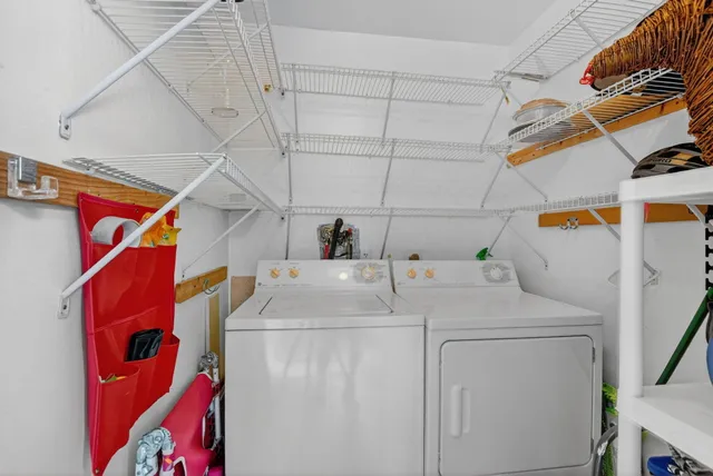 a view of a patio with couches and potted plants