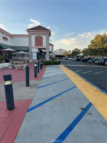 a lobby with furniture and a table