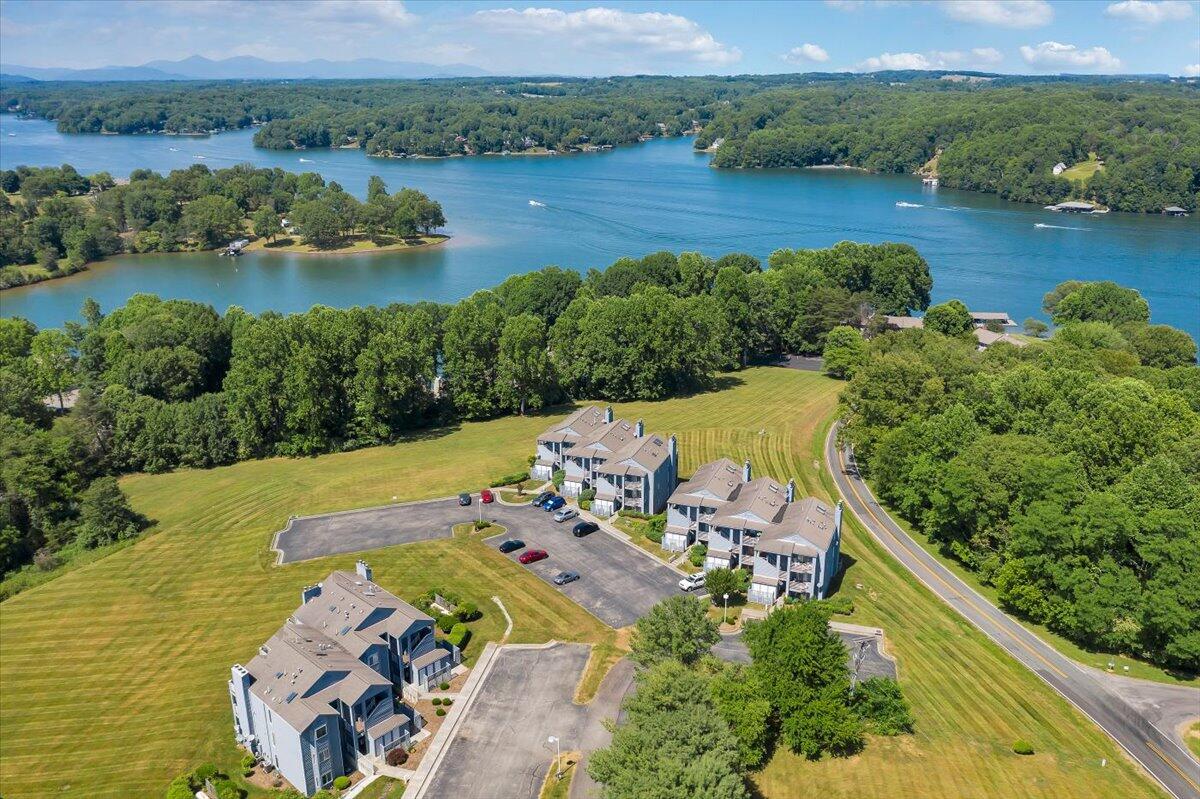 an aerial view of a residential houses with outdoor space