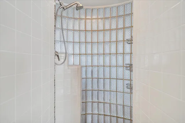 a bathroom with a shower curtain