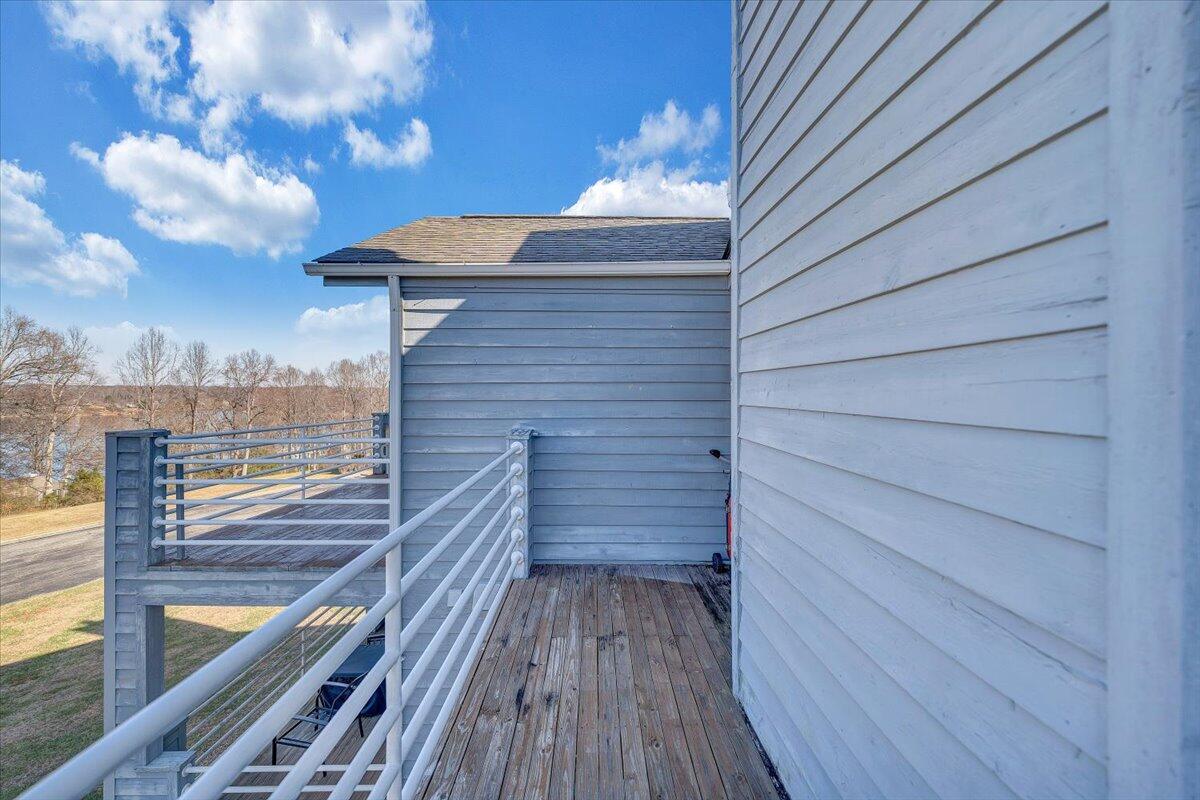 71 Waterside Circle, Unit D6 Moneta, VA 24121 - Photo 26 of 52 a view of a balcony with wooden floor