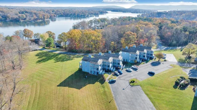 an aerial view of lake residential house with outdoor space