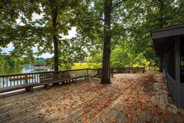 a view of a patio with wooden floor