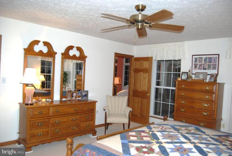 7218 Clyde Jones Road Owings, MD 20736 - Photo 9 of 9 a room with furniture and window