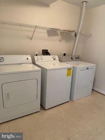 a bathroom with a sink a toilet and bathtub