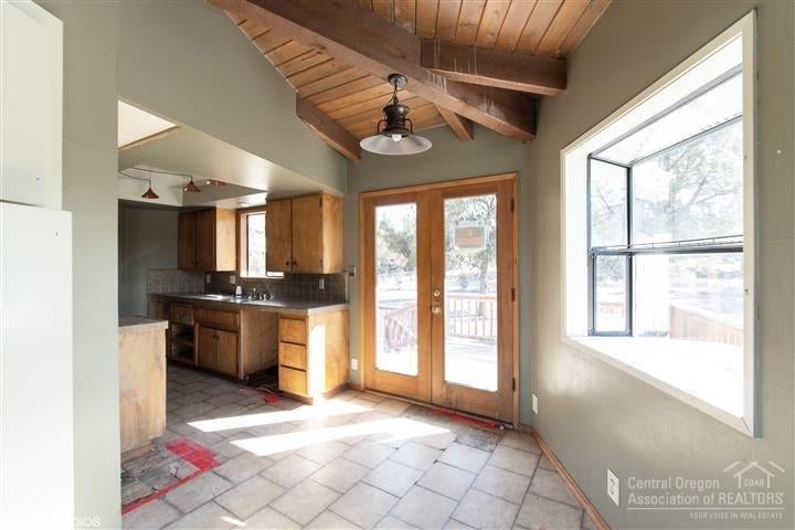 62260 Deer Trail Road Bend, OR 97701 - Photo 11 of 24 Dining room has doors leading out to the