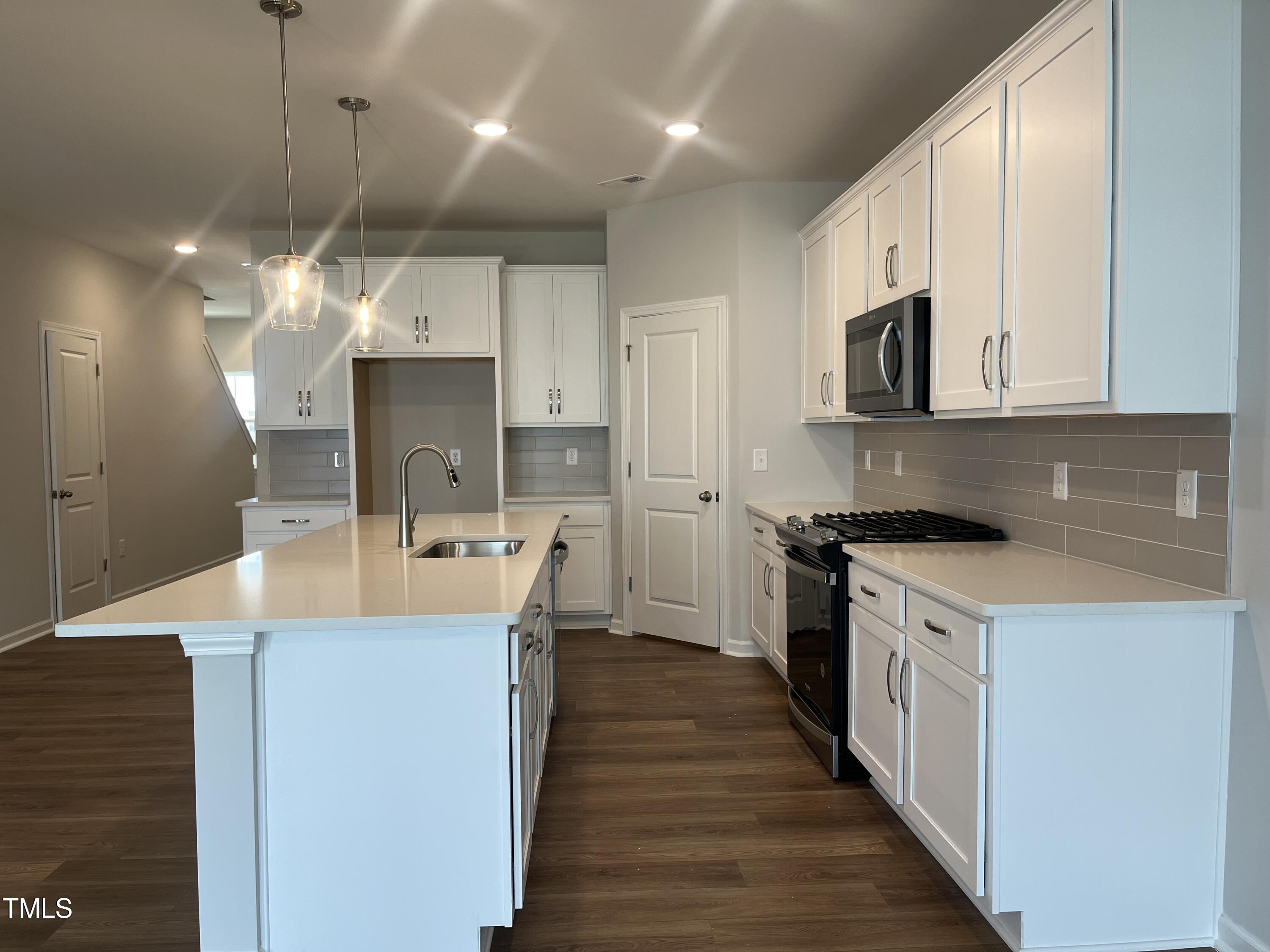 3121 Ranger Drive, Unit 40 Durham, NC 27703 - Photo 9 of 21 9 - Kitchen to pantry