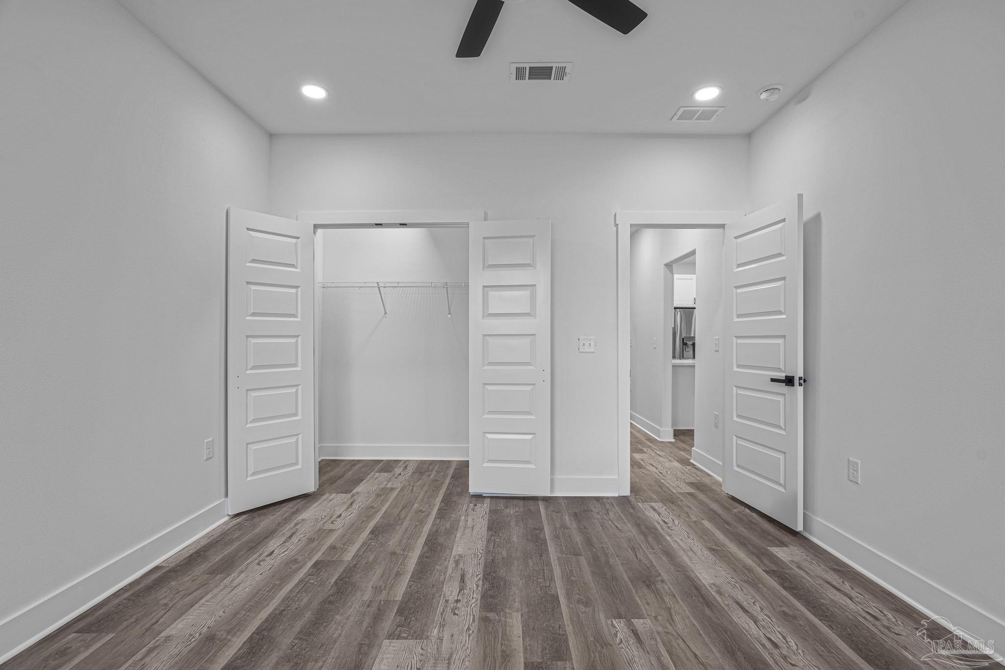 5005 Saufley Field Road Pensacola, FL 32526 - Photo 16 of 27 wooden floor in an empty room