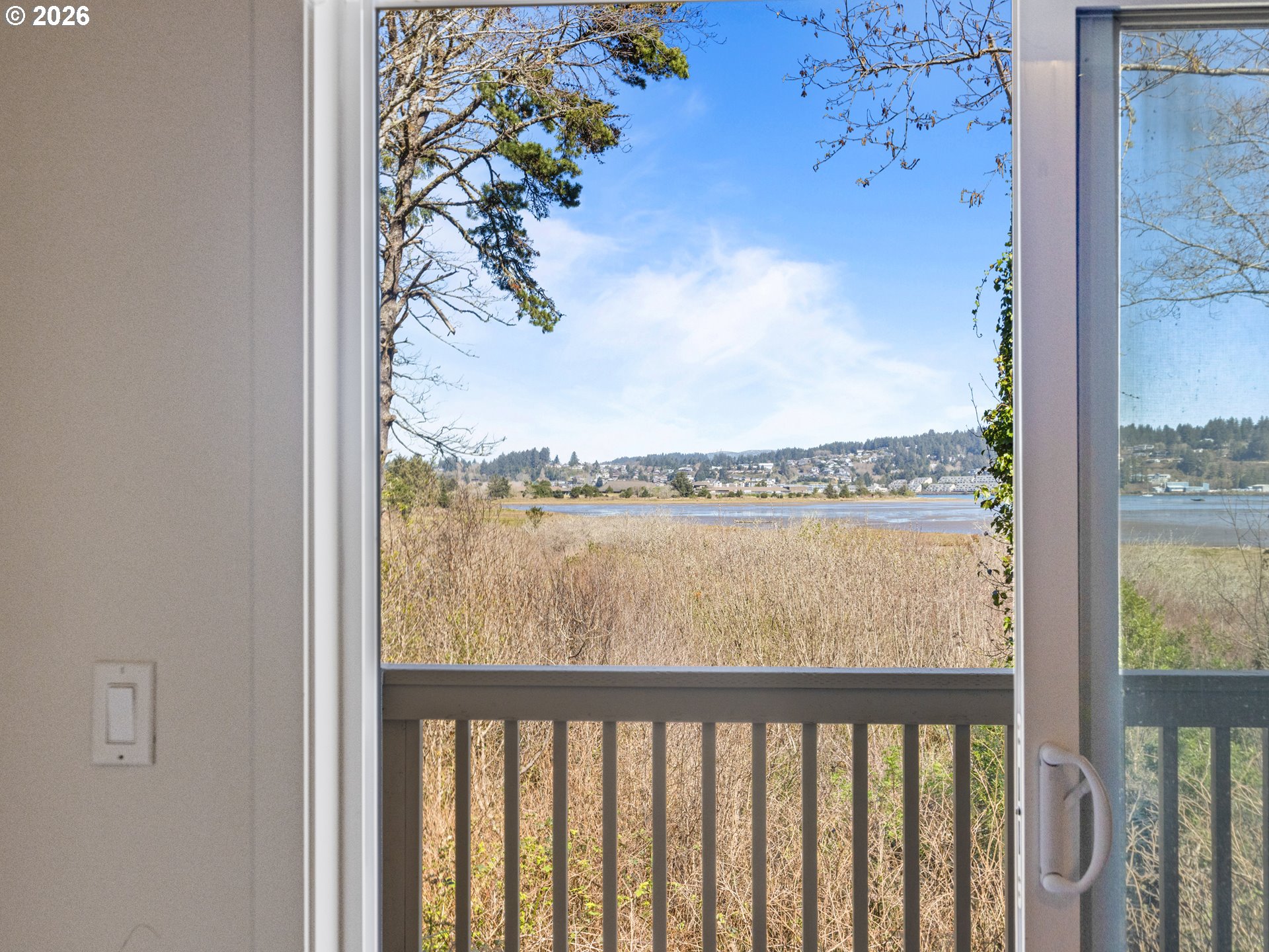 475 Southeast 35th Street, Unit C15 Newport, OR 97366 - Photo 20 of 41 a view of a balcony next to a yard
