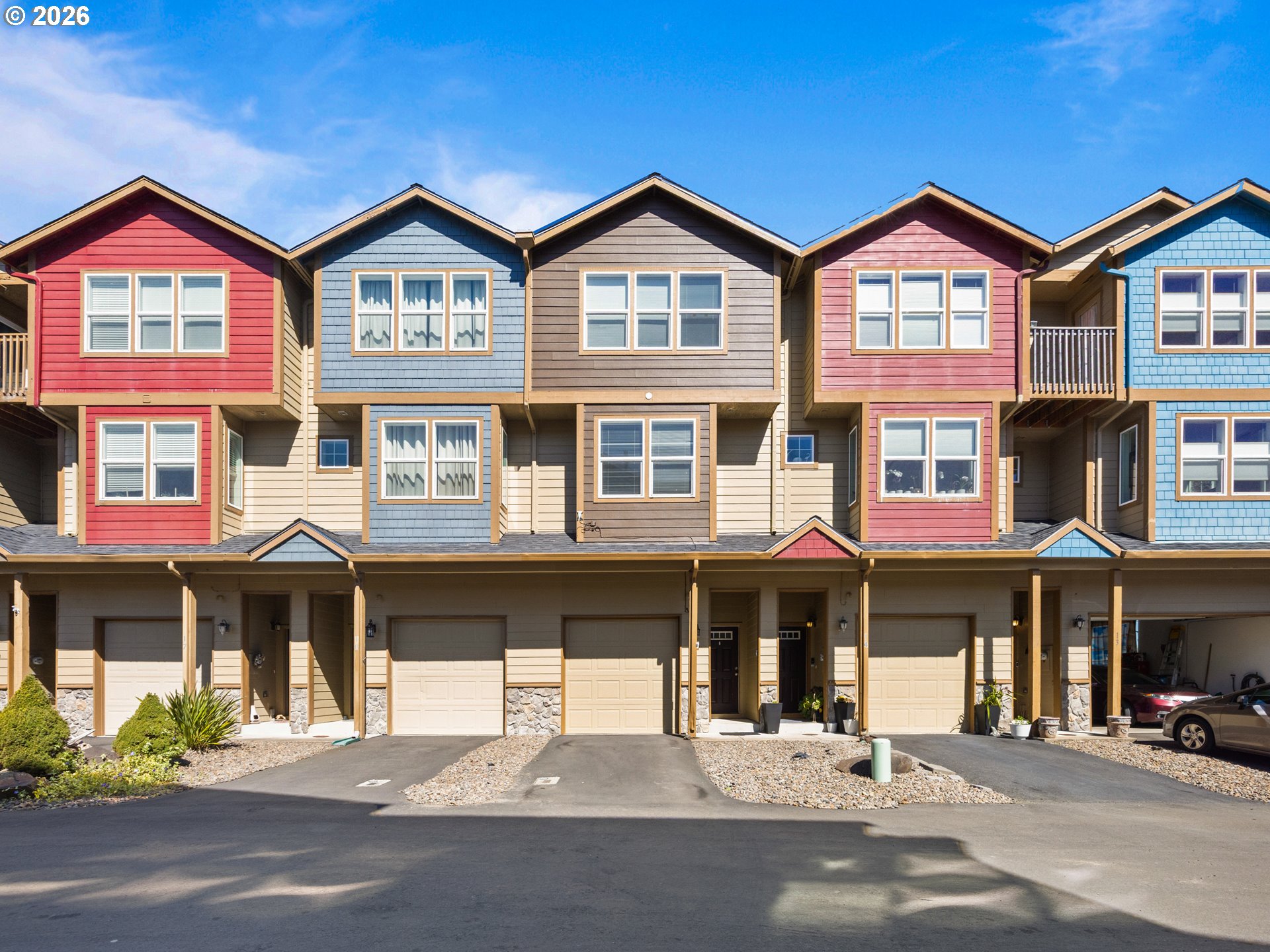 475 Southeast 35th Street, Unit C15 Newport, OR 97366 - Photo 2 of 41 a front view of a building with a yard