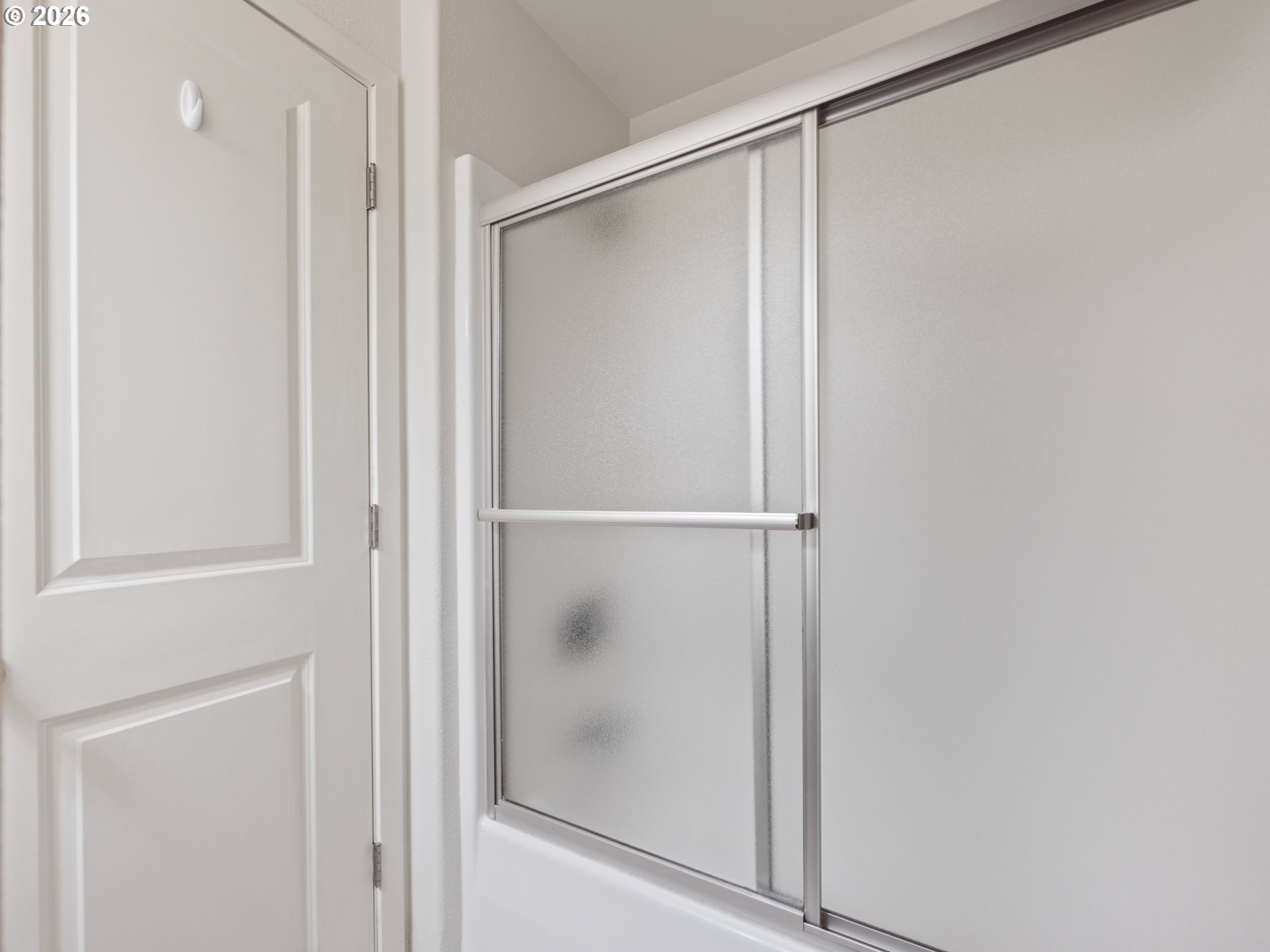 475 Southeast 35th Street, Unit C15 Newport, OR 97366 - Photo 28 of 41 a bathroom with a glass shower door