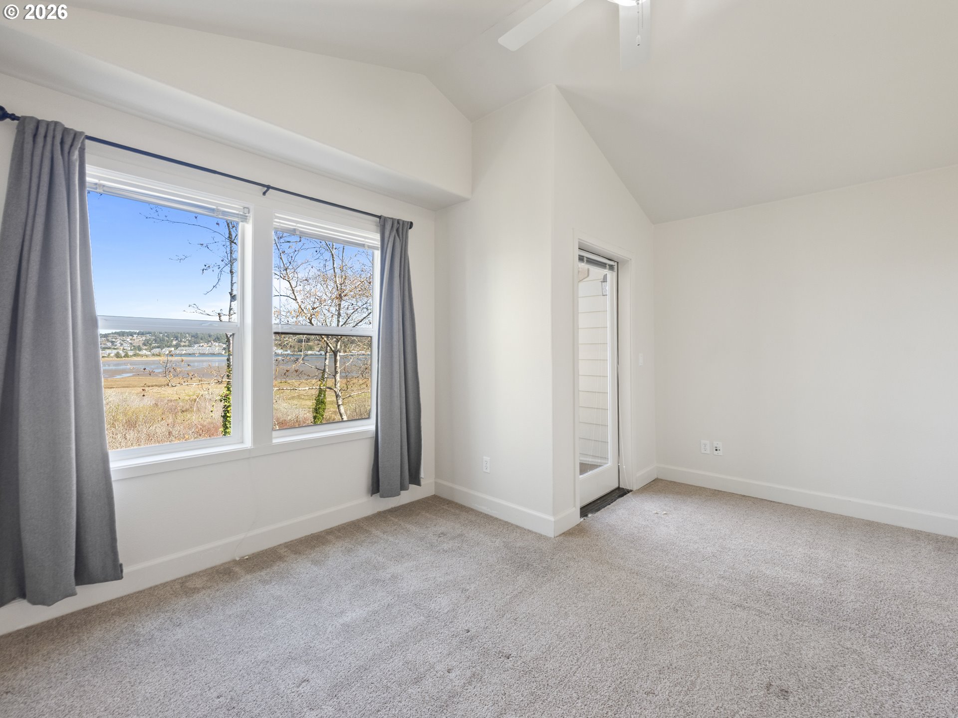 475 Southeast 35th Street, Unit C15 Newport, OR 97366 - Photo 31 of 41 an empty room with a window