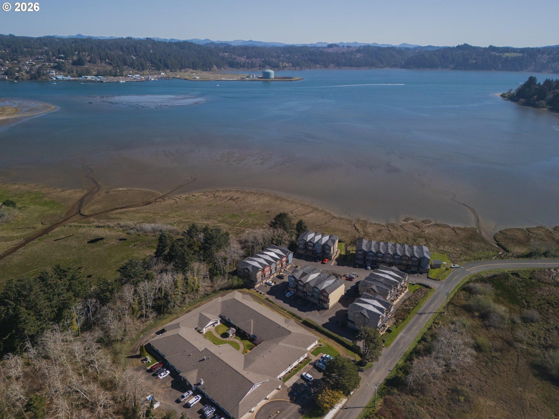 475 Southeast 35th Street, Unit C15 Newport, OR 97366 - Photo 41 of 41 a view of a lake with a mountain