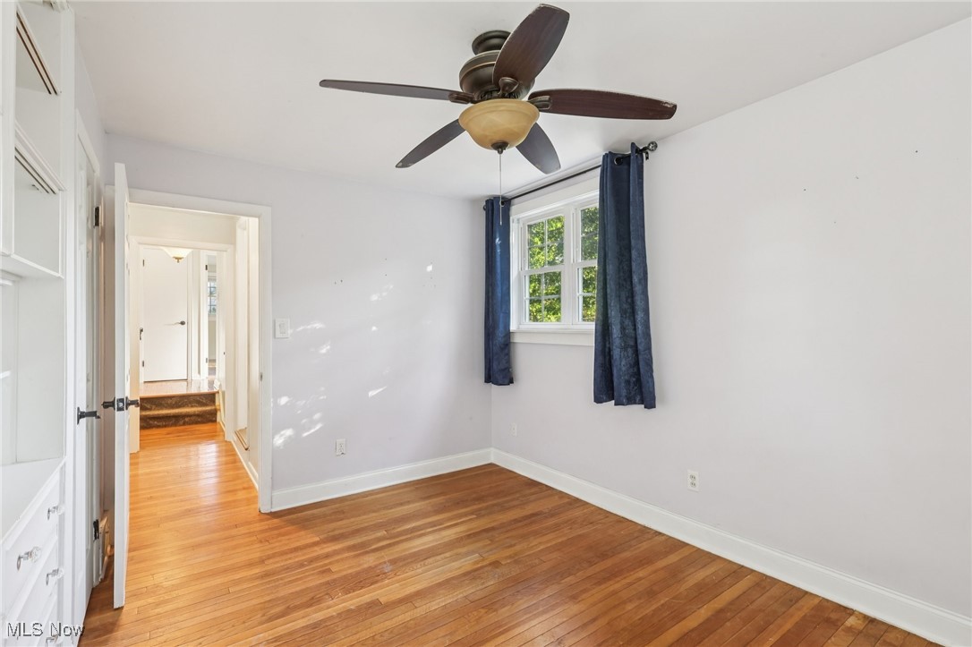 1151 Croyden Road Lyndhurst, OH 44124 - Photo 22 of 37 bedroom featuring light wood-style flooring and a ceiling fan