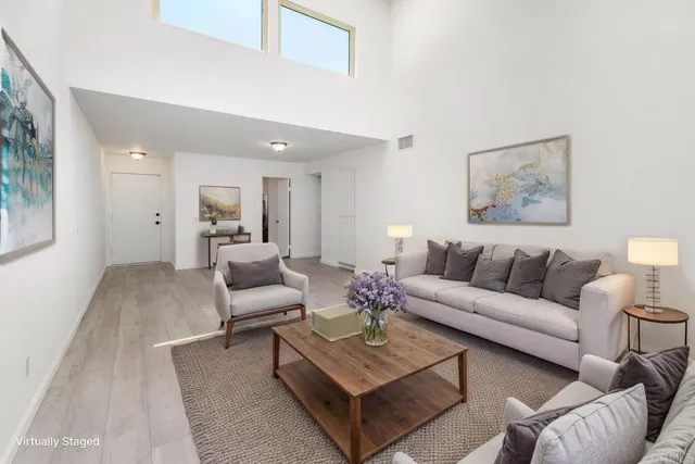 a living room with furniture and a couch