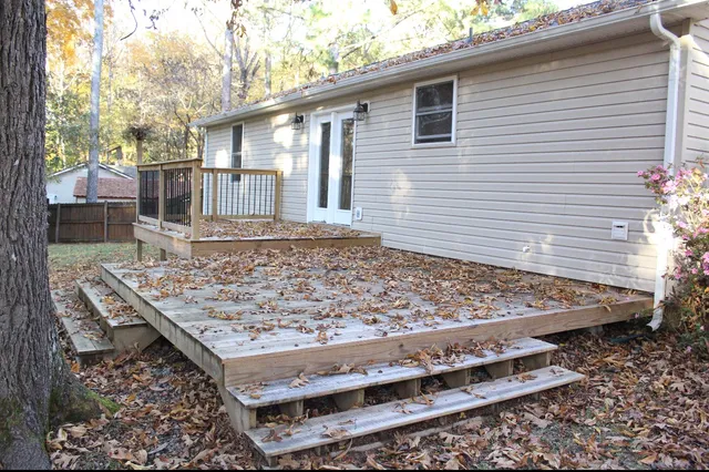 a view of a backyard with a patio