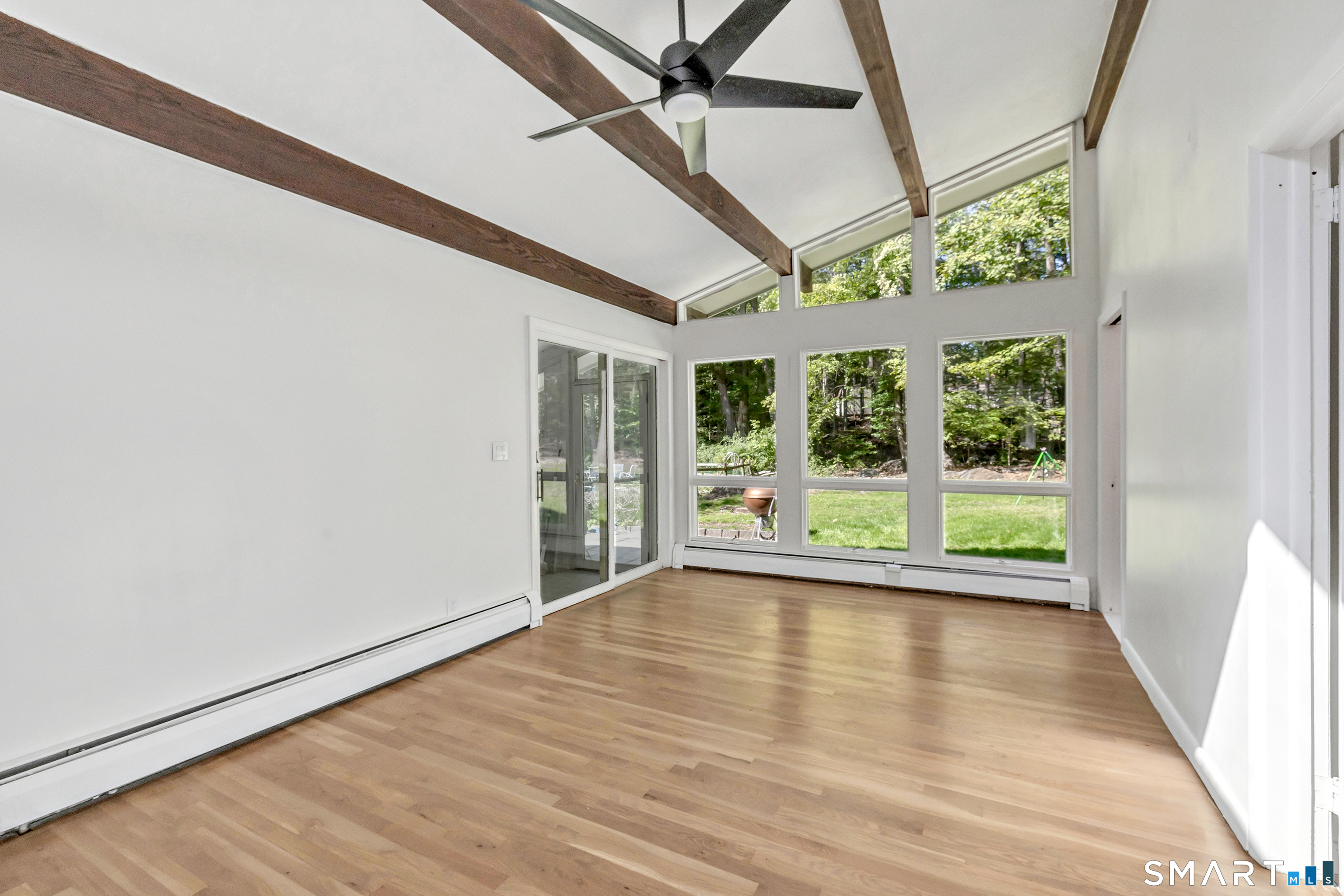 48 Crestwood Road Monroe, CT 06468 - Photo 18 of 32 a view of room with window and wooden floor
