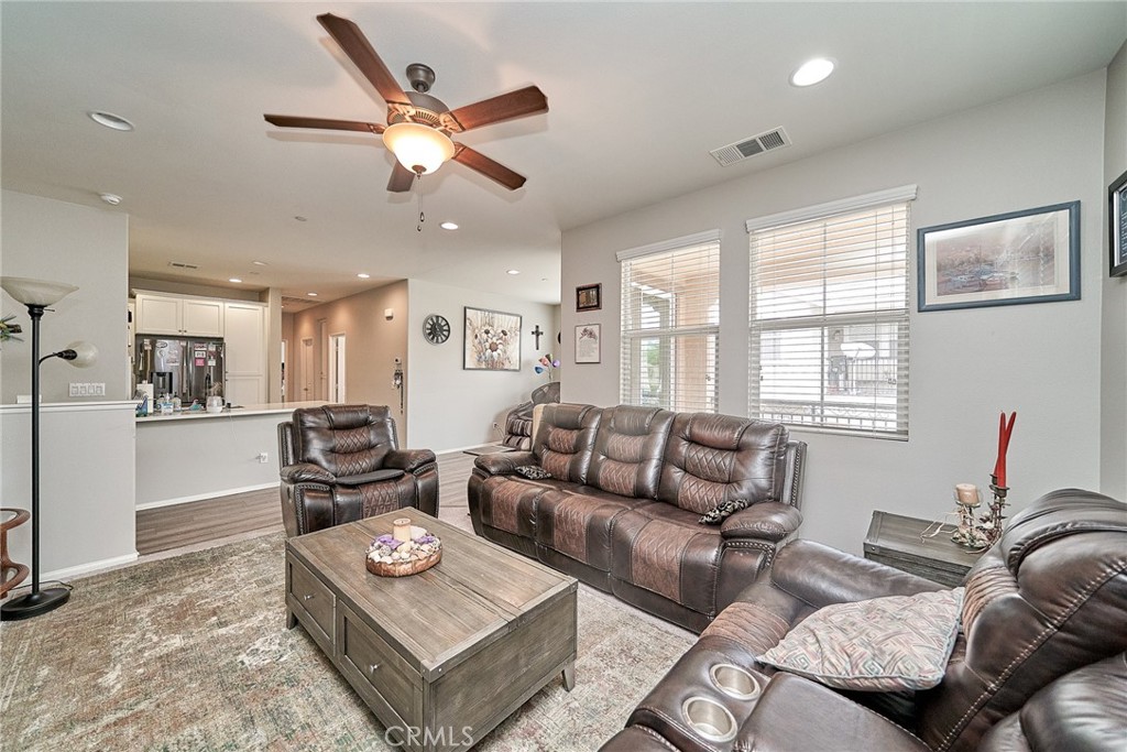 16001 Chase Road, Unit 96 Fontana, CA 92336 - Photo 1 of 1 a living room with furniture and a window