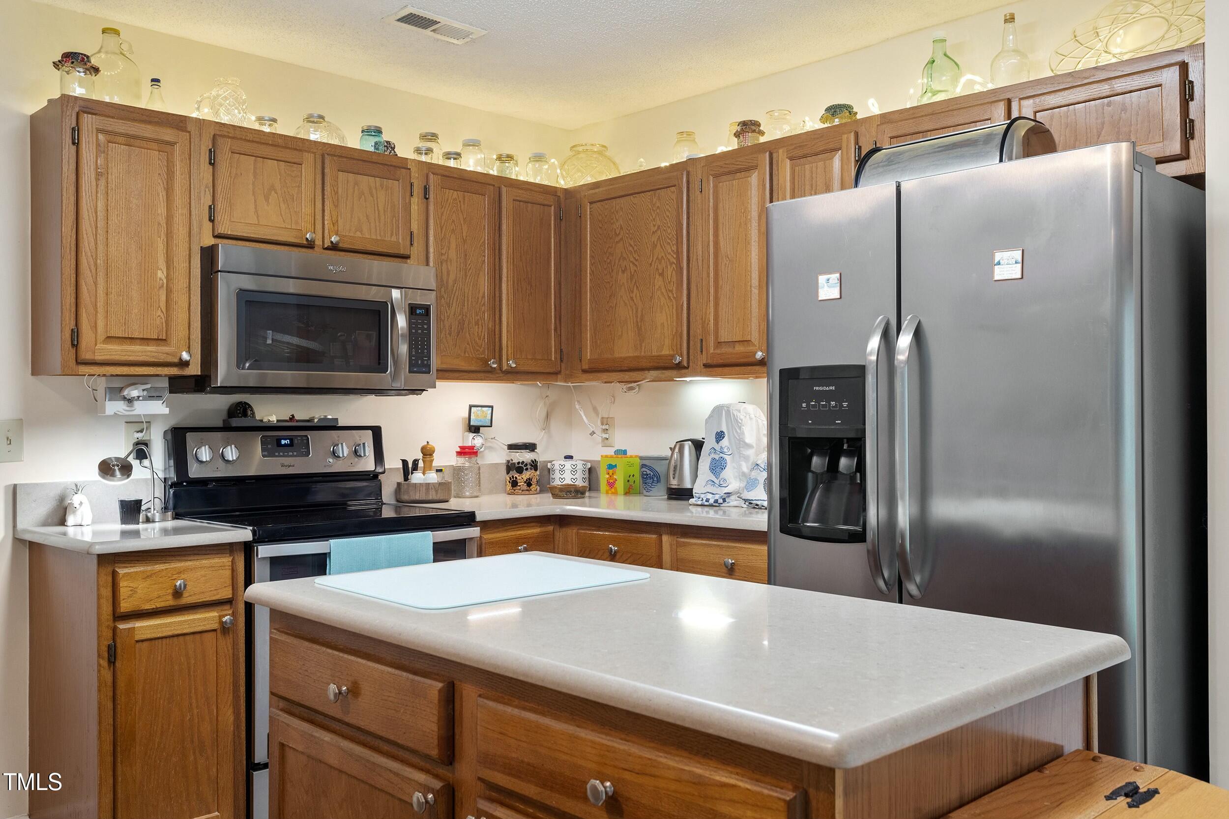11821 Fairlie Place Raleigh, NC 27613 - Photo 5 of 34 tempImage1gvJcl