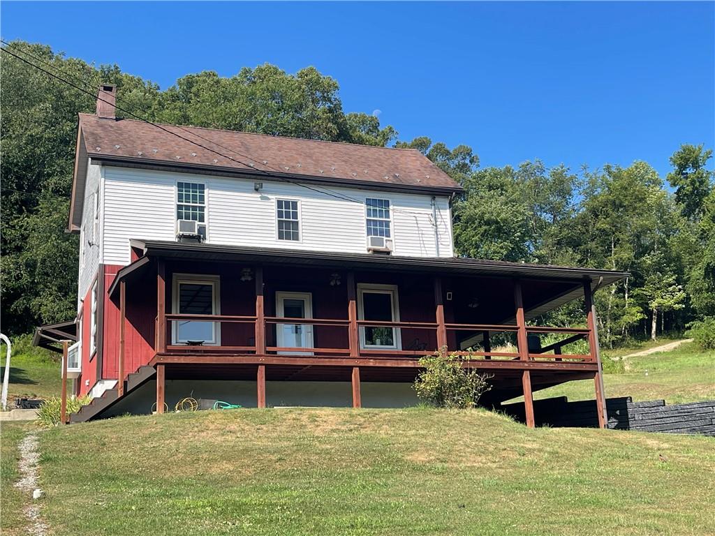 489 Jack Road Vandergrift, PA 15690 - Photo 2 of 47 a backyard of a house with yard and trampoline