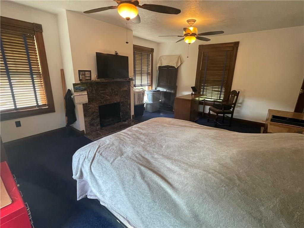 489 Jack Road Vandergrift, PA 15690 - Photo 23 of 47 a bedroom with a bed and a flat screen tv