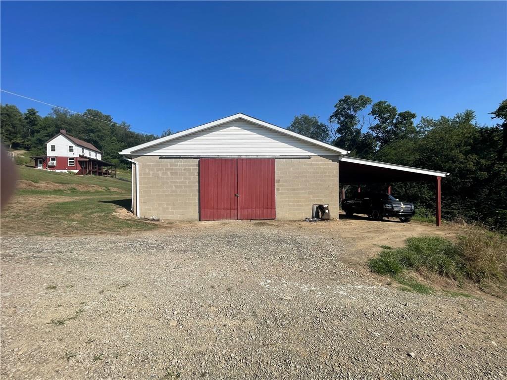 489 Jack Road Vandergrift, PA 15690 - Photo 41 of 47 a front view of a house with a yard and garage