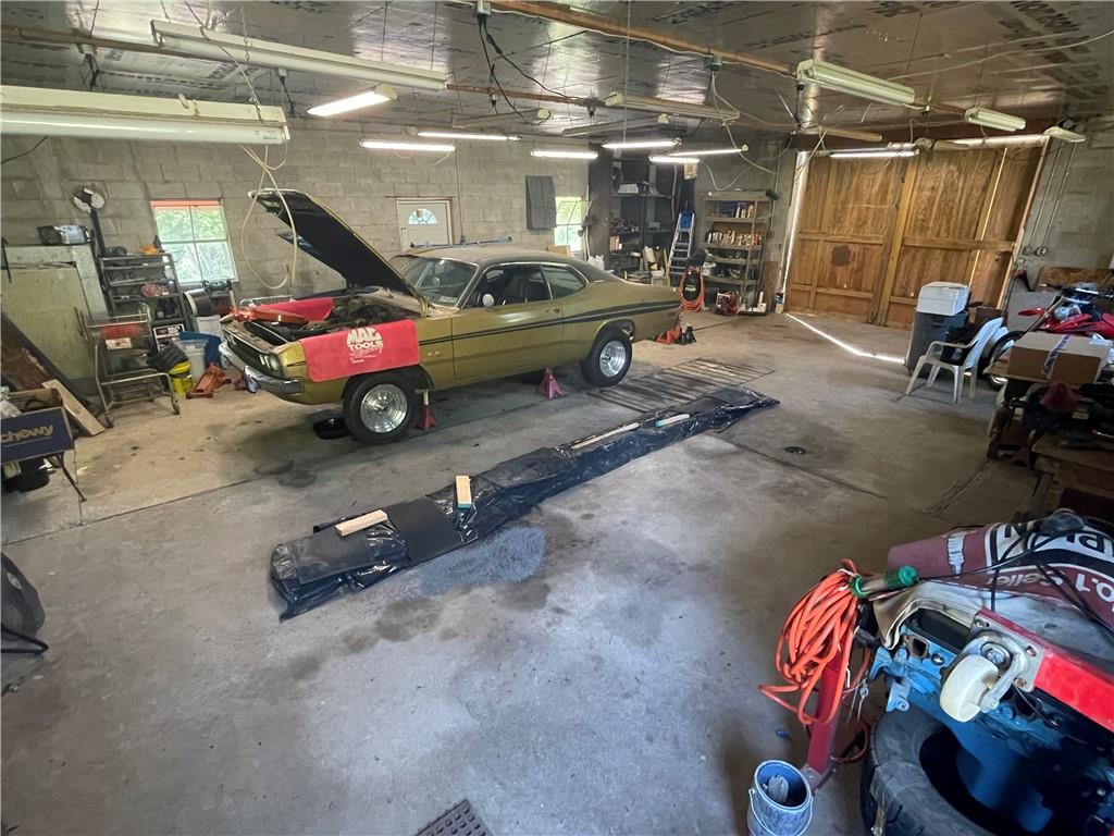489 Jack Road Vandergrift, PA 15690 - Photo 42 of 47 a view of a garage with a car and a garage